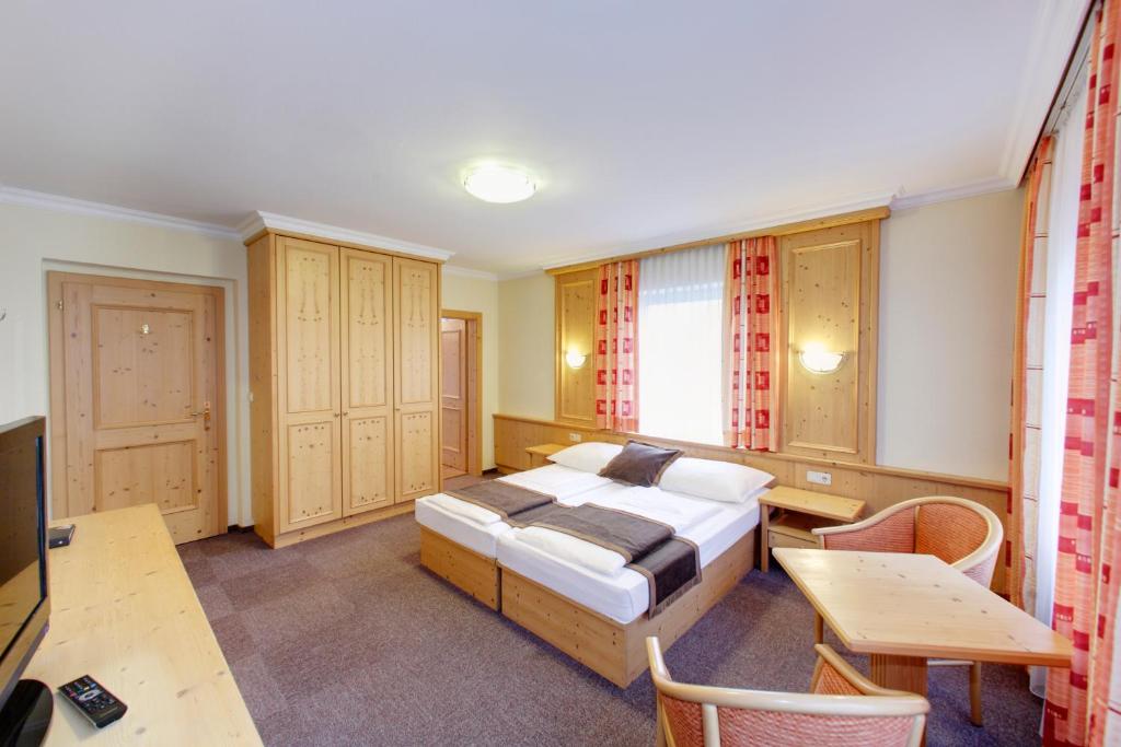 Postel nebo postele na pokoji v ubytování Hotel Magerl