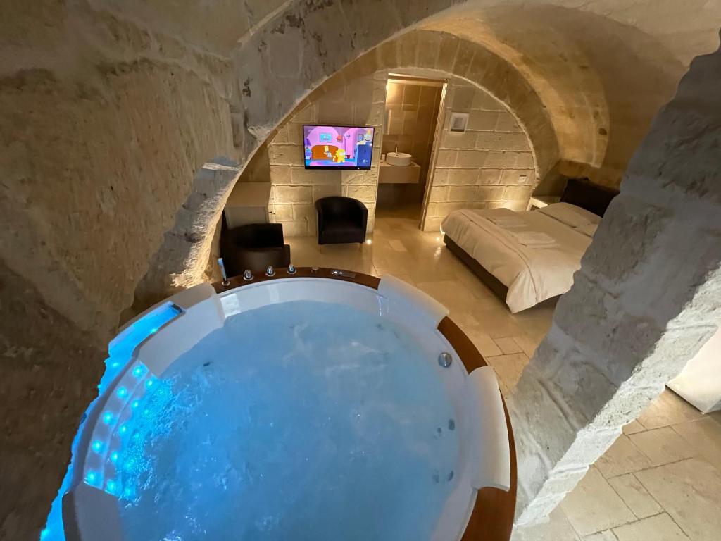 TV a/nebo společenská místnost v ubytování Barbacana46 Guest House