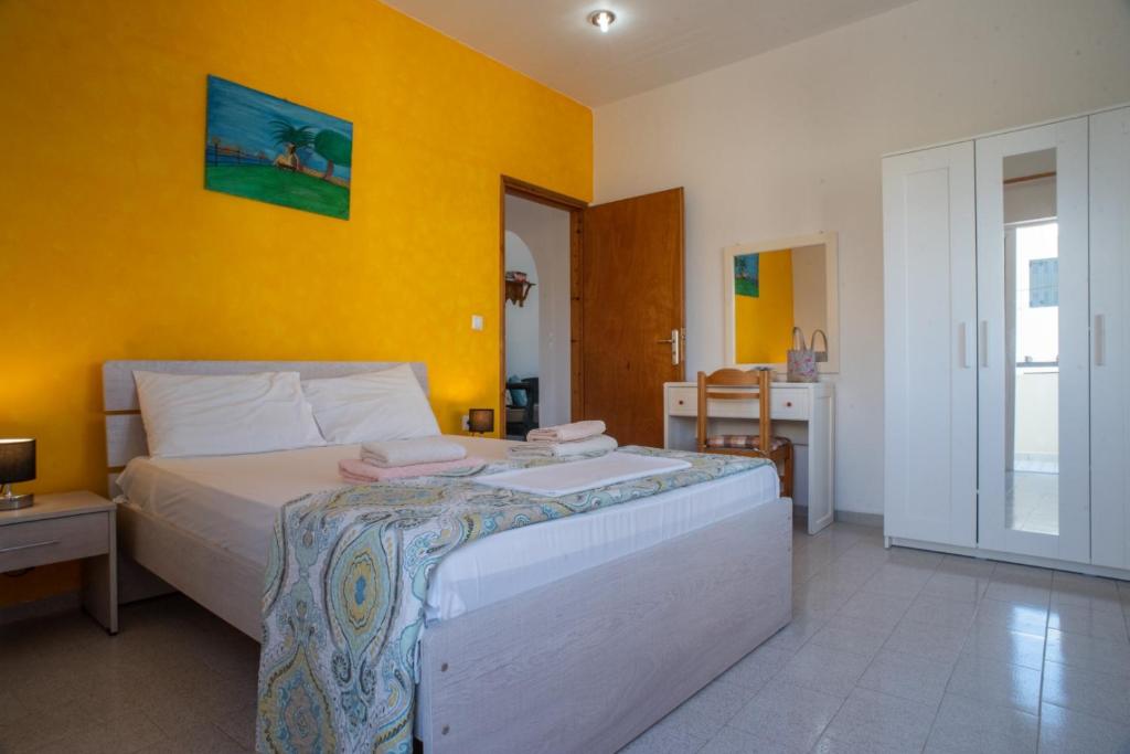Posteľ alebo postele v izbe v ubytovaní Villa Dina Apartments