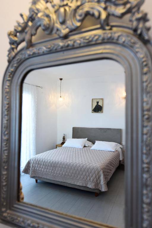 Postel nebo postele na pokoji v ubytování Tsakanos Home