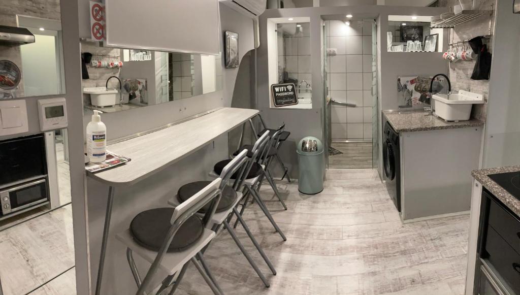 Kuchyň nebo kuchyňský kout v ubytování Marilyn City Center