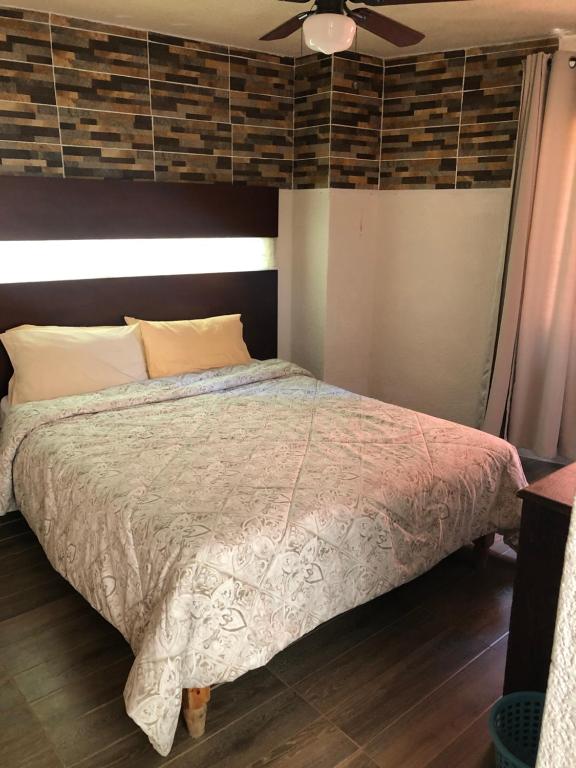 Postel nebo postele na pokoji v ubytování Hotel del Conde