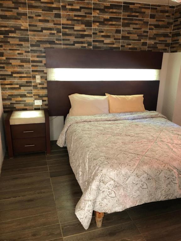 Postel nebo postele na pokoji v ubytování Hotel del Conde