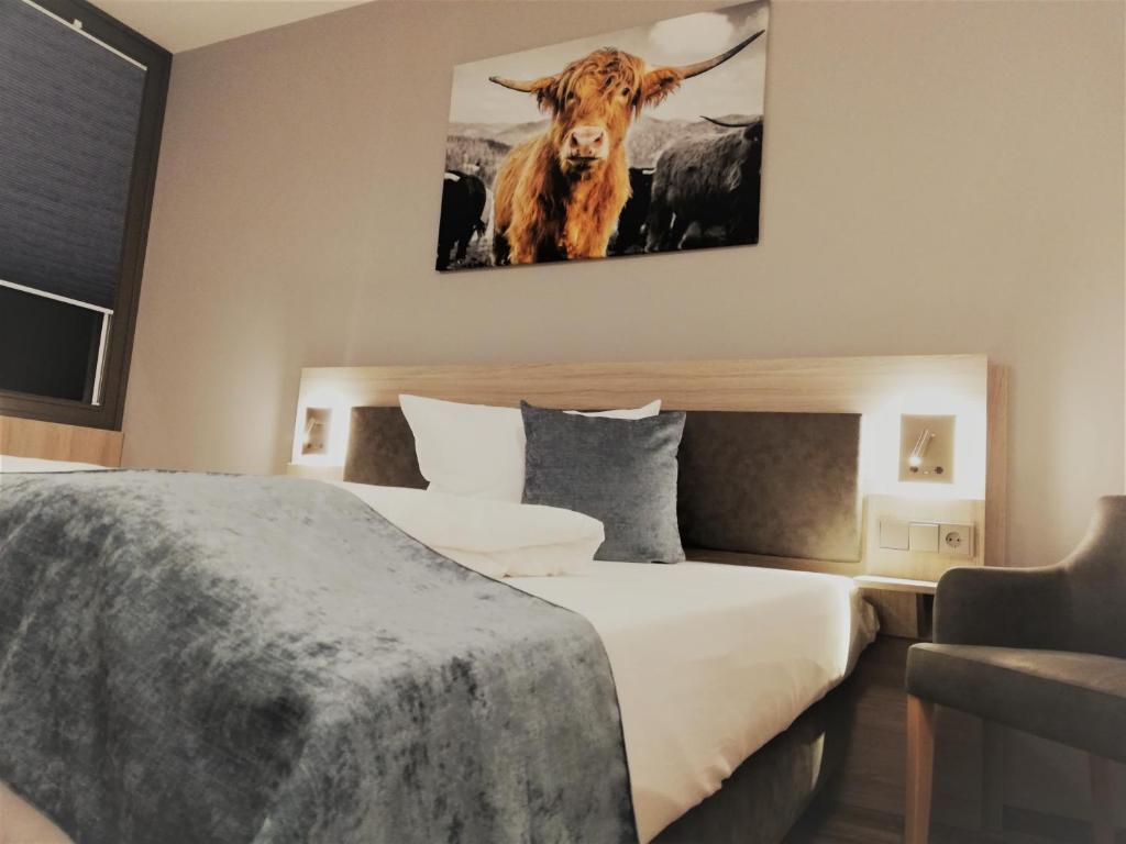 Postel nebo postele na pokoji v ubytování Hotel & Restaurant Alte Molkerei Kölleda
