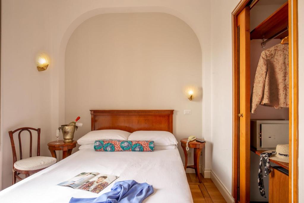 Postel nebo postele na pokoji v ubytování Hotel Emona Aquaeductus