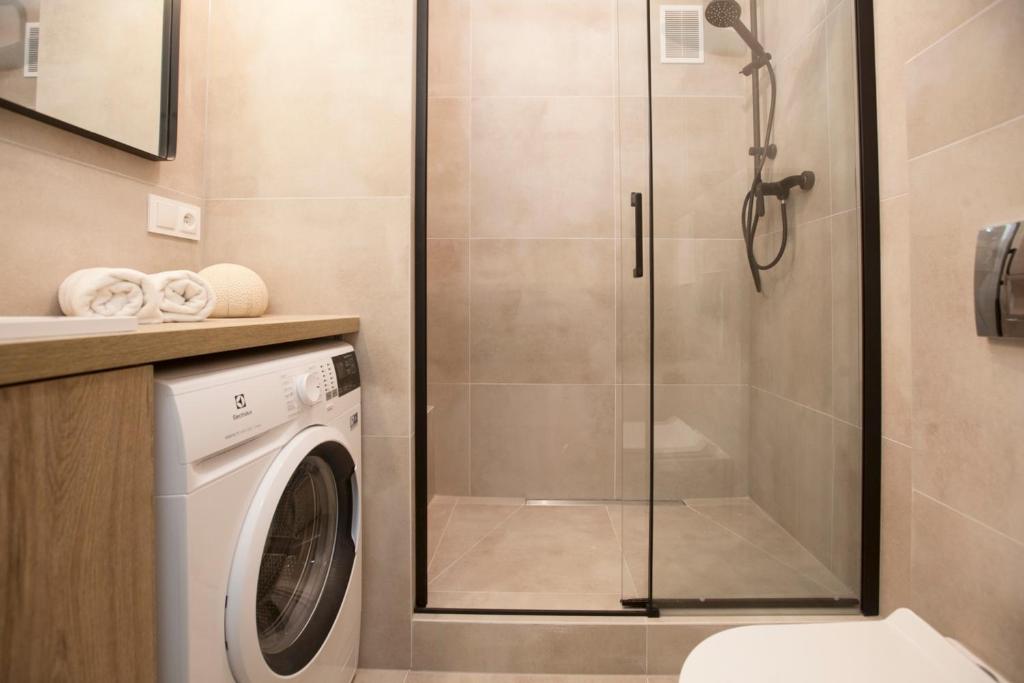 Kúpeľňa v ubytovaní Warsaw Concierge Stalowa