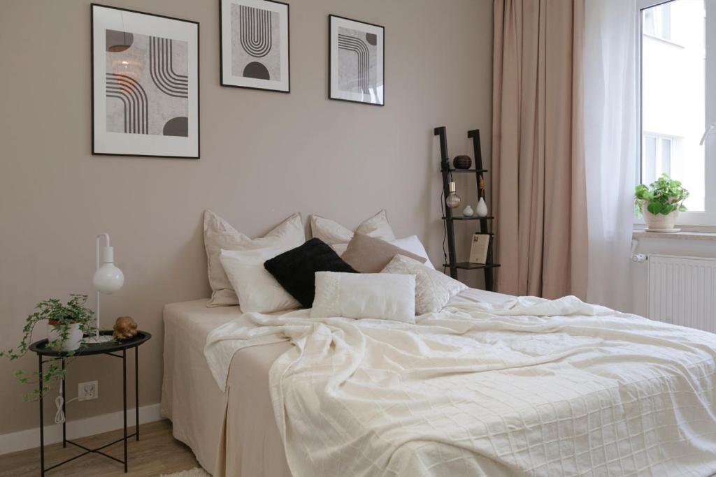 Posteľ alebo postele v izbe v ubytovaní Warsaw Concierge Stalowa
