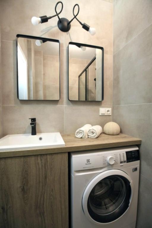 Kúpeľňa v ubytovaní Warsaw Concierge Stalowa