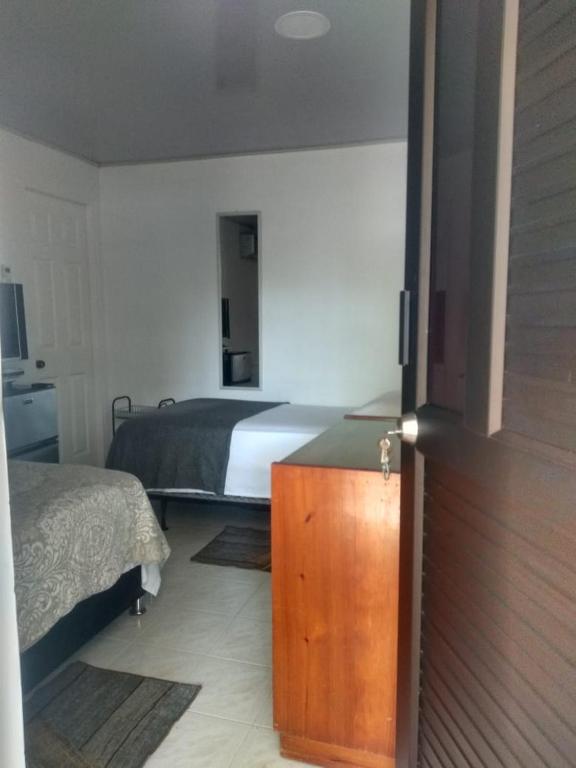 Postel nebo postele na pokoji v ubytování Casa De Polita