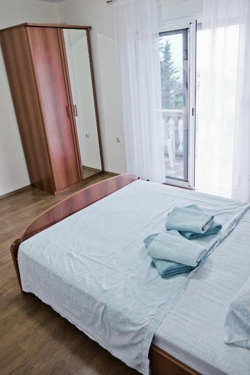 Postel nebo postele na pokoji v ubytování Apartments Klara