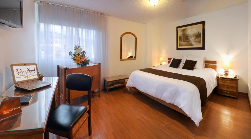 Postel nebo postele na pokoji v ubytování Hotel Don Saul