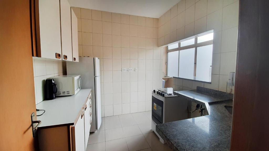  Apto grande com rede de descanso na sala
