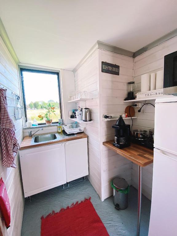 Kuchyň nebo kuchyňský kout v ubytování Galleriet BnB