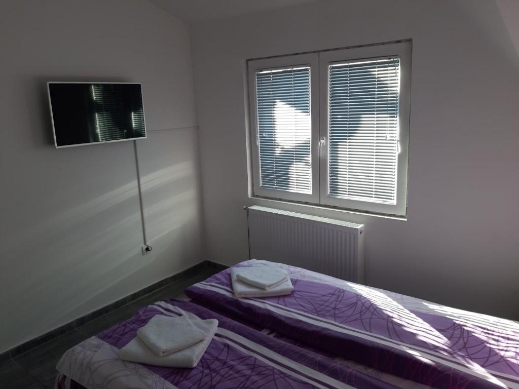 Postel nebo postele na pokoji v ubytování S Apartmani Priboj