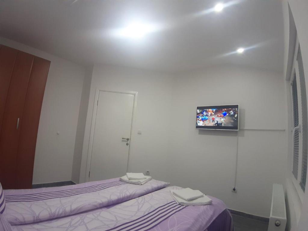 Postel nebo postele na pokoji v ubytování S Apartmani Priboj