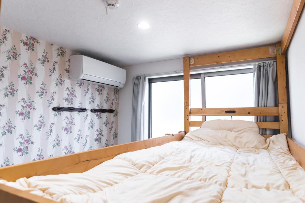 nestay inn tokyo senjuにあるベッド
