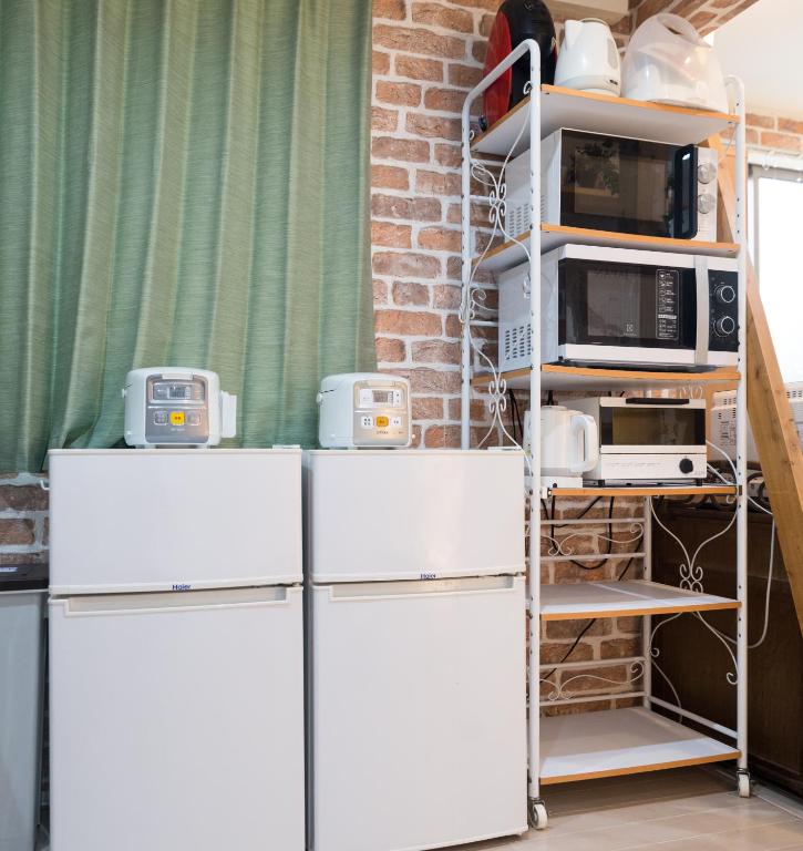 nestay inn tokyo senjuにあるキッチンまたは簡易キッチン