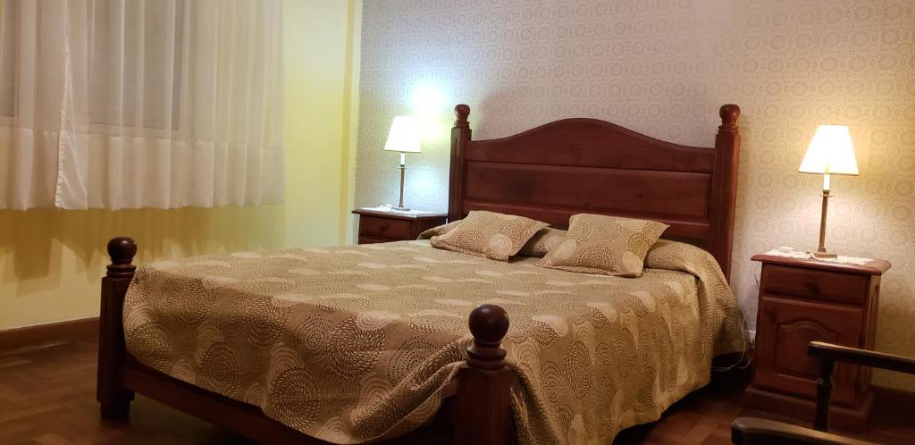 מיטה או מיטות בחדר ב-Amplio y cómodo Dpto. céntrico a 2 cuadras del Mar