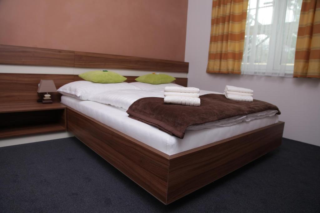 Postel nebo postele na pokoji v ubytování Primus Hotel & Apartments