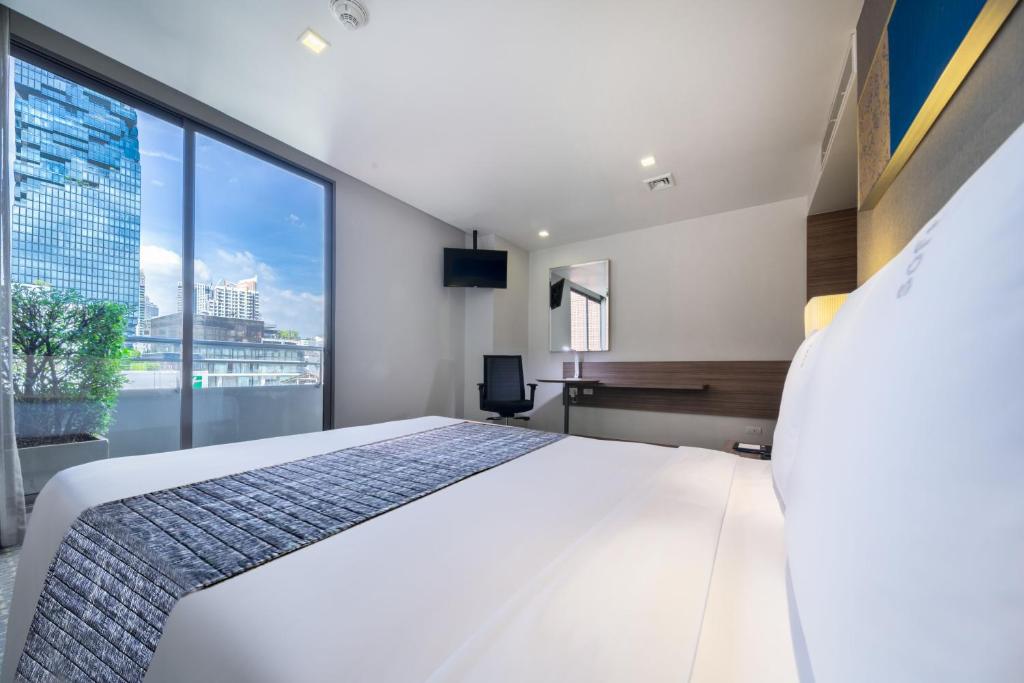 Postel nebo postele na pokoji v ubytování Holiday Inn Express Bangkok Sathorn by IHG