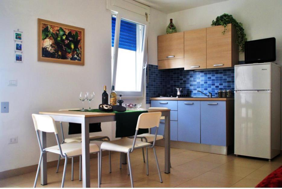 Kuchyň nebo kuchyňský kout v ubytování Residence Le Palme