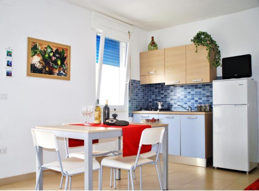 Kuchyň nebo kuchyňský kout v ubytování Residence Le Palme