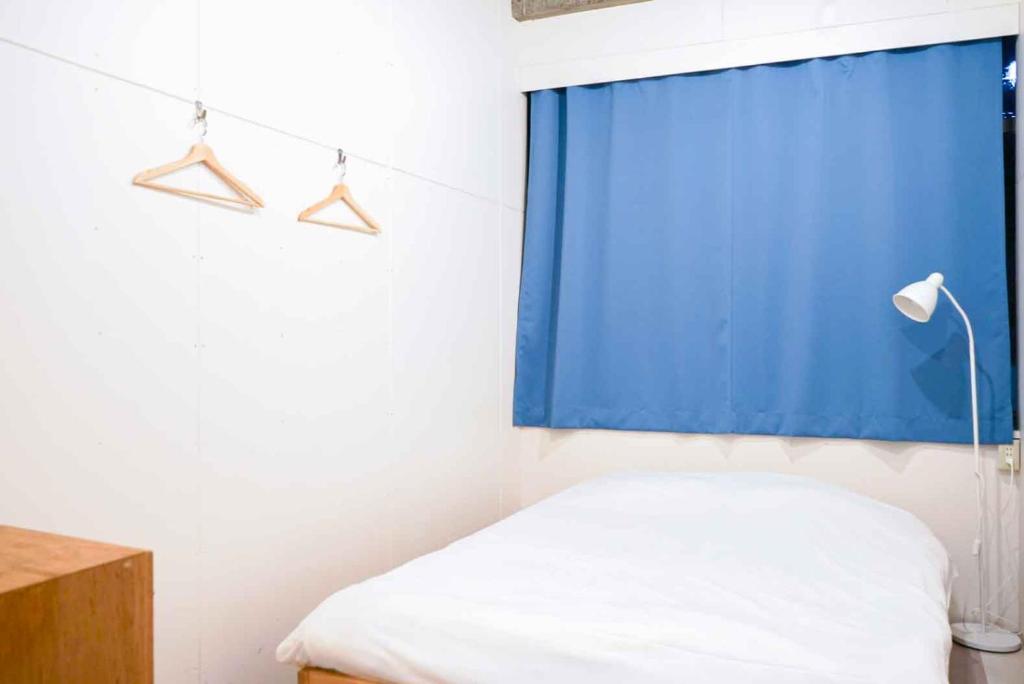 Postel nebo postele na pokoji v ubytování Hostel TangaTable