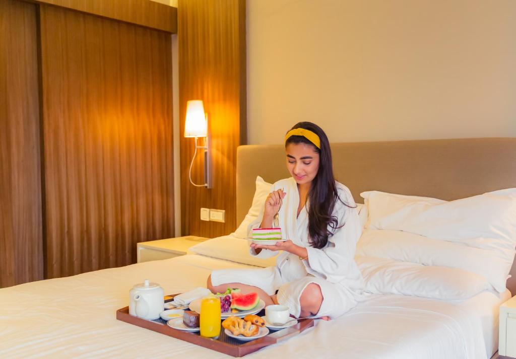 Postel nebo postele na pokoji v ubytování Hyatt Regency Delhi