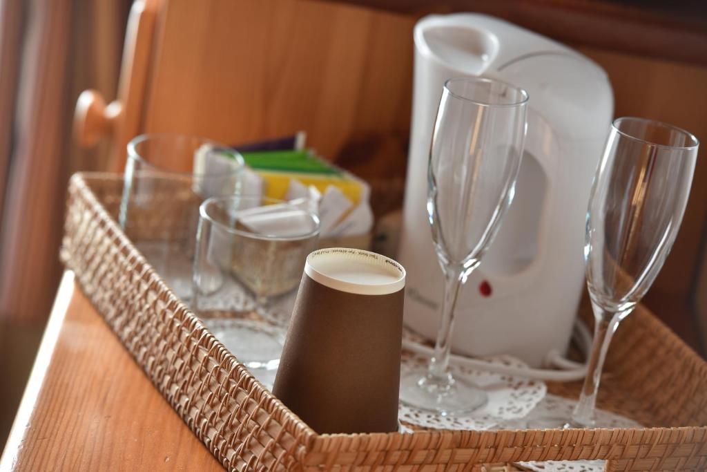 Příslušenství pro přípravu čaje a kávy v ubytování Hotel Livigno
