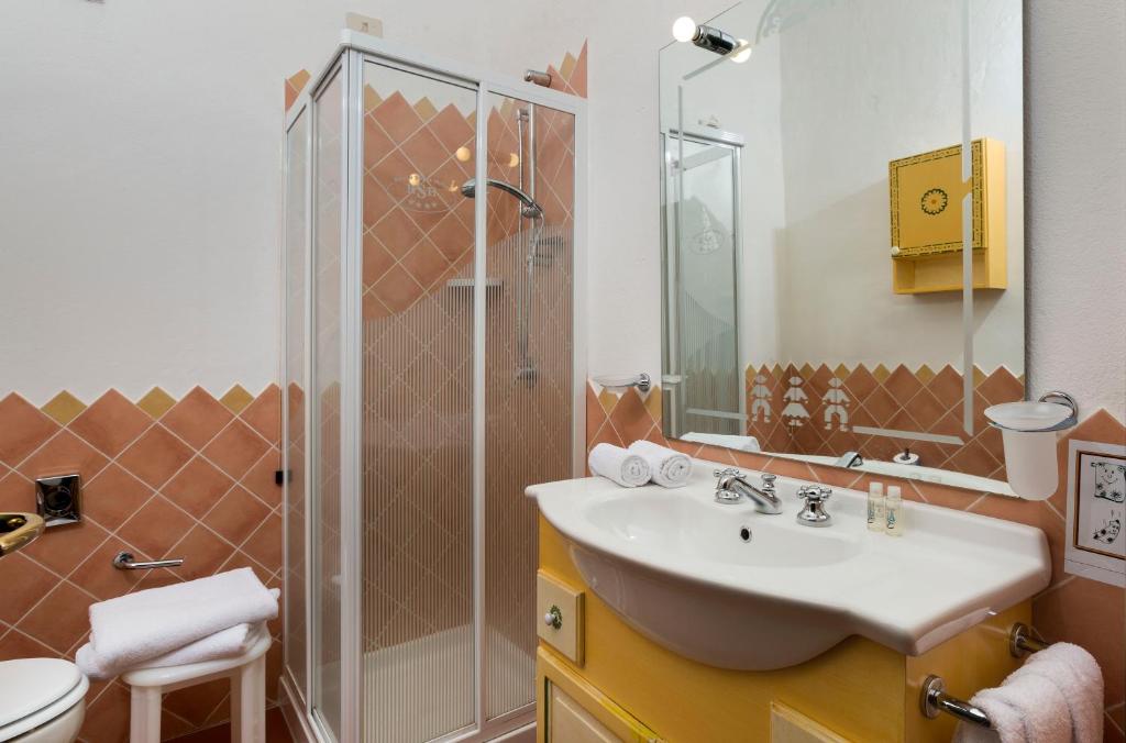 Koupelna v ubytování Hotel Rocce Sarde