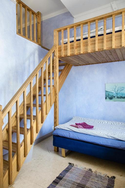 Postel nebo postele na pokoji v ubytování Kullagården