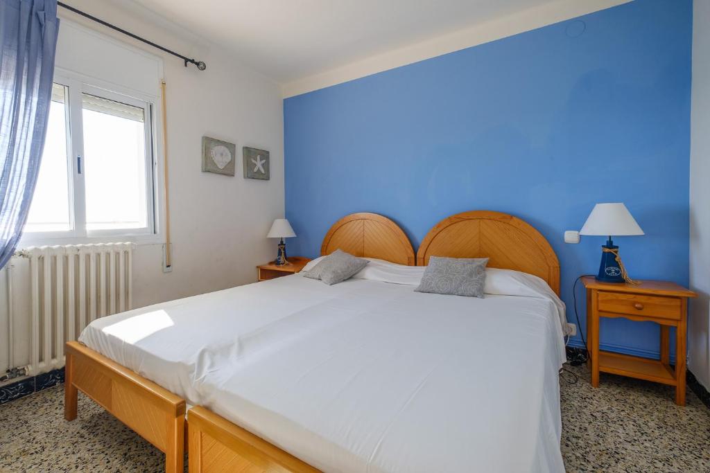 Postel nebo postele na pokoji v ubytování Apartamentos Deauville