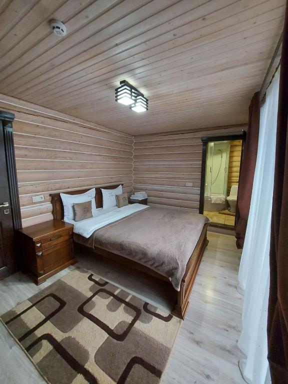 Postel nebo postele na pokoji v ubytování Guest House Turda