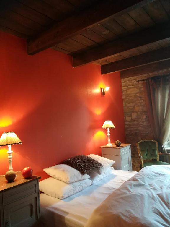 Postel nebo postele na pokoji v ubytování L'Ancienne Forge - Gîte à la ferme