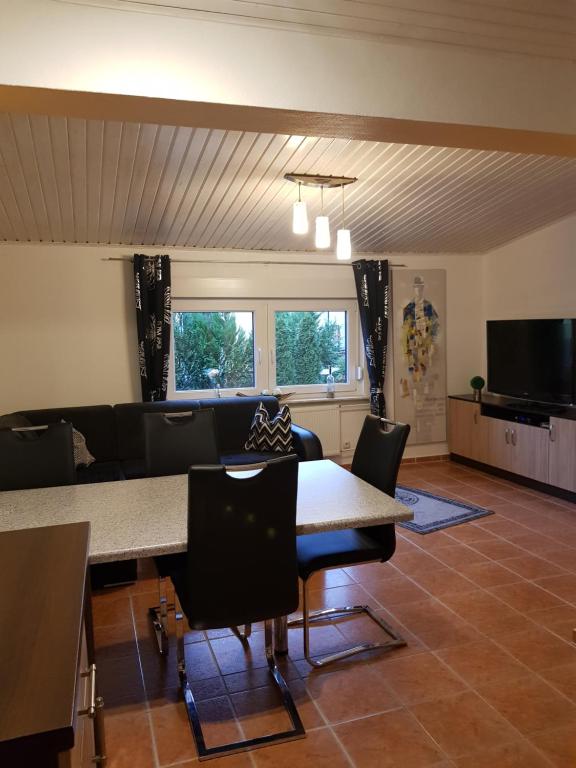 TV a/nebo společenská místnost v ubytování Strandidyll