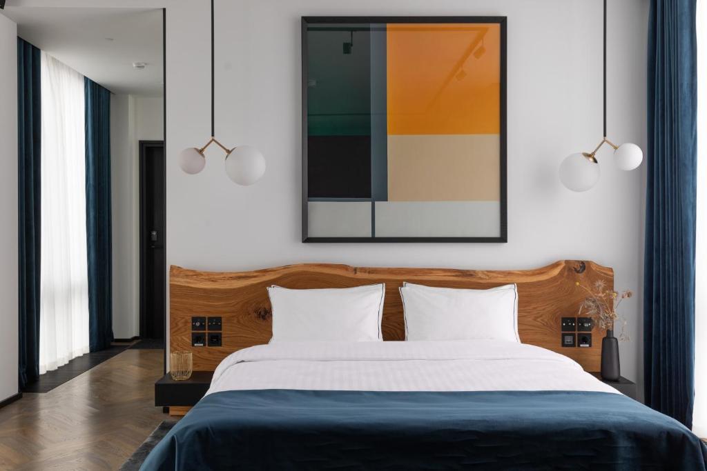 Postel nebo postele na pokoji v ubytování A22 Hotel