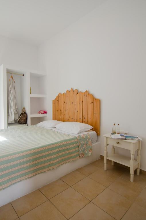 Voodi või voodid majutusasutuse Marias Rooms toas
