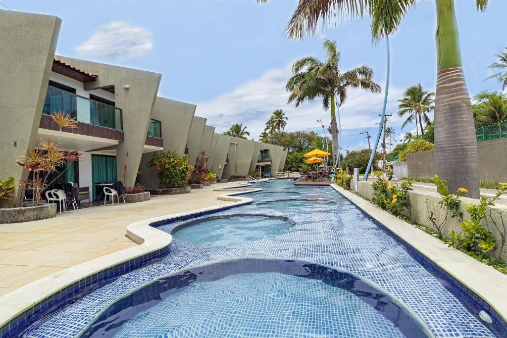  Fit with pool view at Aquazul Flat by Carpediem