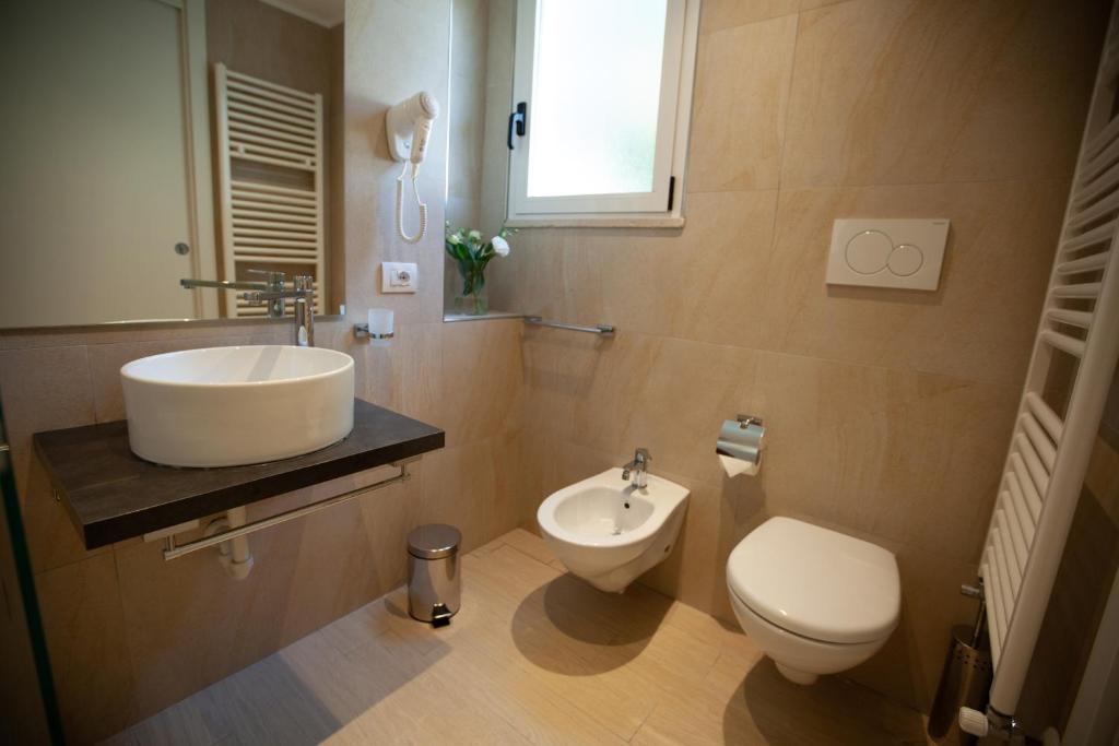 Koupelna v ubytování Hotel Maestri