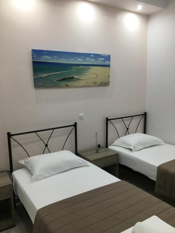 Voodi või voodid majutusasutuse Anesis Hotel toas