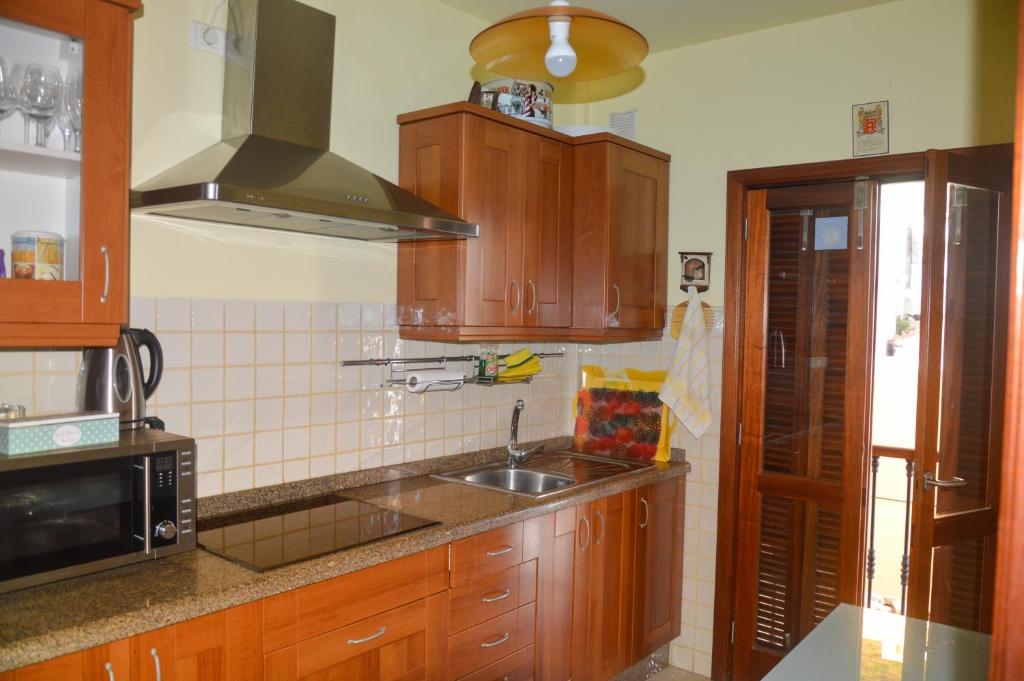 Kuchyň nebo kuchyňský kout v ubytování Apartamento en Casco Histórico