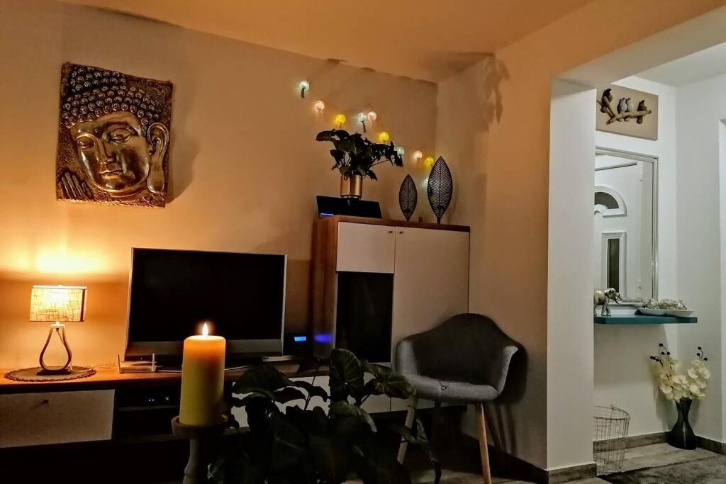 Televízia a/alebo spoločenská miestnosť v ubytovaní Éva Háza Nyugalom/Pihenés/Relax