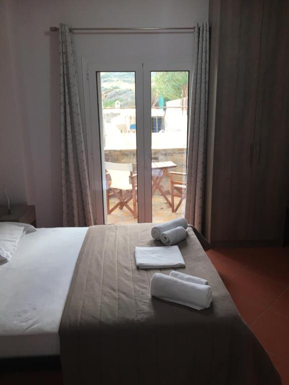 Voodi või voodid majutusasutuse Anesis Hotel toas
