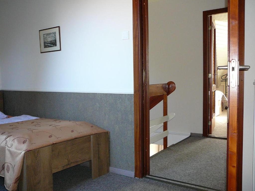 Postel nebo postele na pokoji v ubytování Dunakanyar Apartment