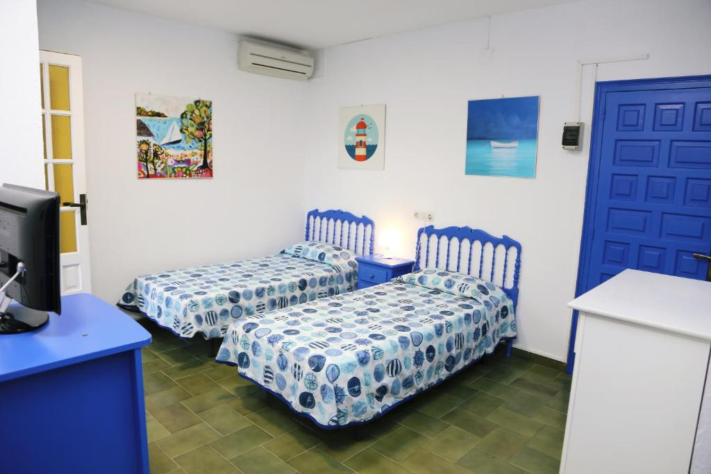 Postel nebo postele na pokoji v ubytování Pensió Solivent