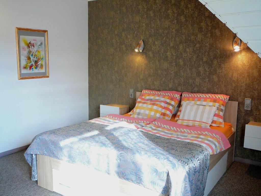 Postel nebo postele na pokoji v ubytování Dunakanyar Apartment