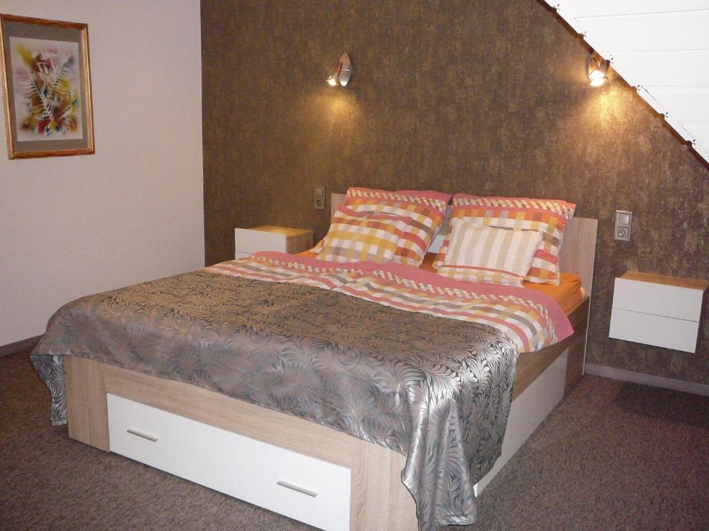 Postel nebo postele na pokoji v ubytování Dunakanyar Apartment