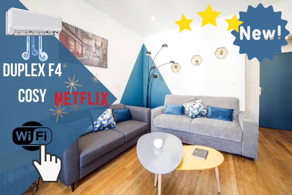 sala de estar con sofá y estrellas en la pared en Appartement Le Grand Dupont du Parc Ste-Marie - OscarNewHome en Nancy