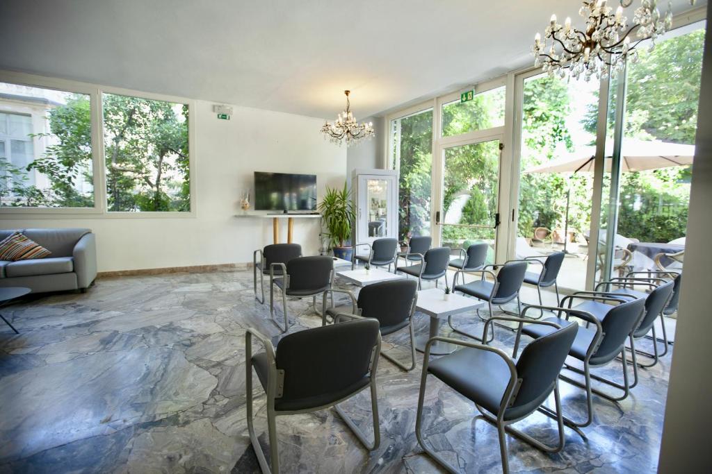 TV a/nebo společenská místnost v ubytování Hotel Maestri