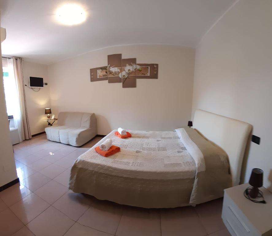 En eller flere senge i et værelse på Villa Leilani B&B